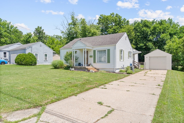708 Clayton St, Columbia, MO 65203 - bungalow-style house featuring an outbuilding, a garage, a front lawn, and driveway