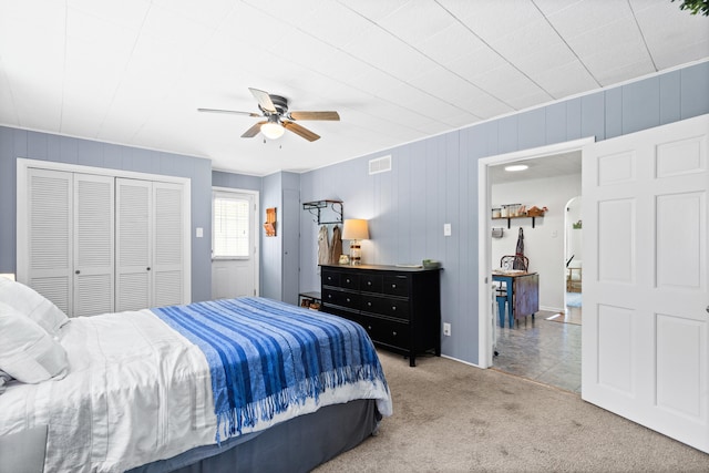 708 Clayton St, Columbia, MO 65203 - bedroom featuring carpet, ceiling fan, and a closet