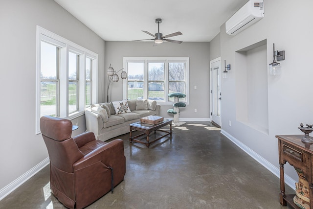 8900 W Graham Rd, Rocheport, MO 65279 - living area featuring a wall unit AC, a ceiling fan, and concrete flooring