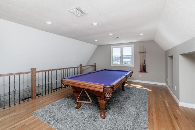 8900 W Graham Rd, Rocheport, MO 65279 - game room featuring wood finished floors, lofted ceiling, a textured ceiling, and recessed lighting
