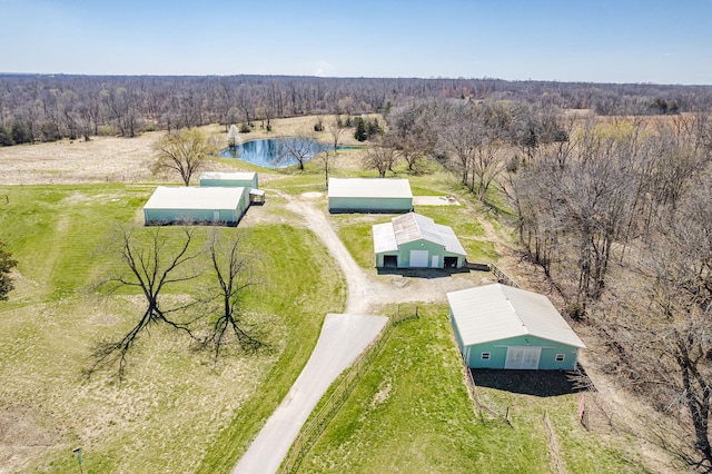 8900 W Graham Rd, Rocheport, MO 65279 - aerial view of property and surrounding area with a nearby body of water and a heavily wooded area