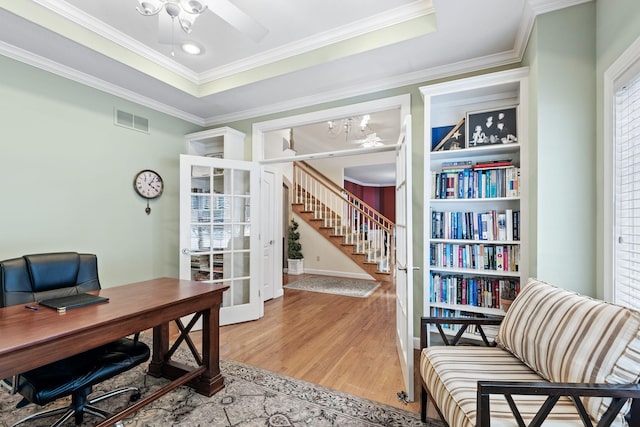 1707 Brookfield Mnr, Columbia, MO 65203 - home office with wood finished floors, ornamental molding, a chandelier, french doors, and a ceiling fan