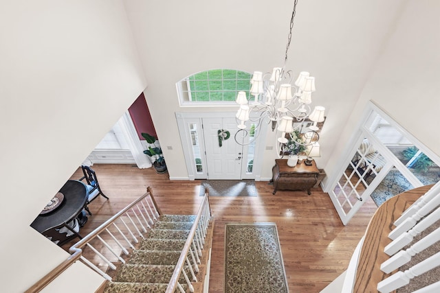 1707 Brookfield Mnr, Columbia, MO 65203 - entryway featuring a high ceiling, wood finished floors, and a chandelier