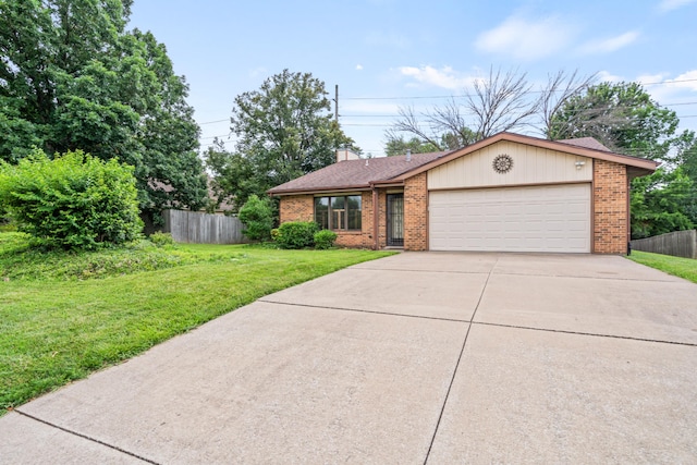 2002 Chapel Hill Rd, Columbia, MO 65203 - view of front of home featuring brick siding, a garage, concrete driveway, a chimney, and a shingled roof