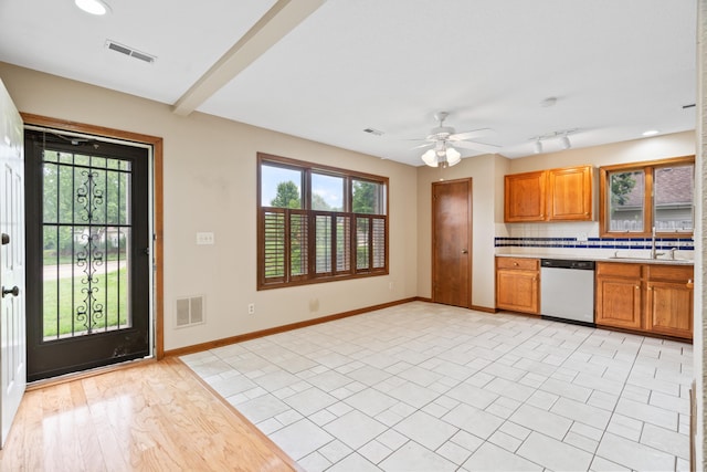 2002 Chapel Hill Rd, Columbia, MO 65203 - kitchen with dishwashing machine, light countertops, plenty of natural light, backsplash, and recessed lighting