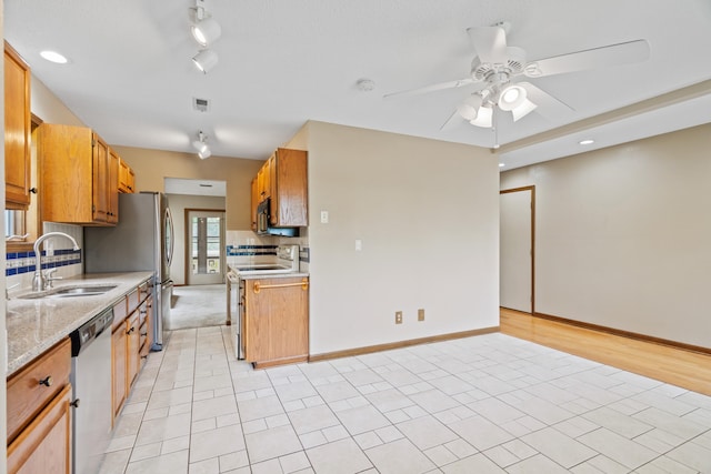 2002 Chapel Hill Rd, Columbia, MO 65203 - kitchen featuring stainless steel dishwasher, white range with electric cooktop, ceiling fan, backsplash, and rail lighting