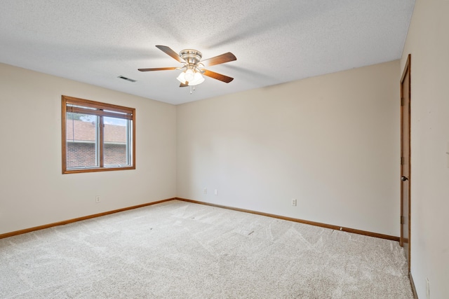 2002 Chapel Hill Rd, Columbia, MO 65203 - empty room with light carpet, ceiling fan, and a textured ceiling