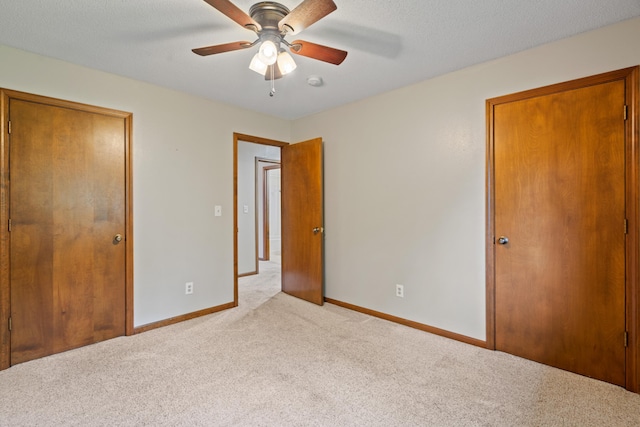2002 Chapel Hill Rd, Columbia, MO 65203 - unfurnished bedroom featuring carpet and ceiling fan