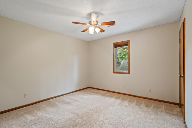 2002 Chapel Hill Rd, Columbia, MO 65203 - carpeted empty room featuring a ceiling fan and a textured ceiling