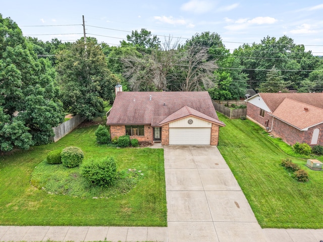 2002 Chapel Hill Rd, Columbia, MO 65203 - view of front facade with brick siding, an attached garage, concrete driveway, and a chimney
