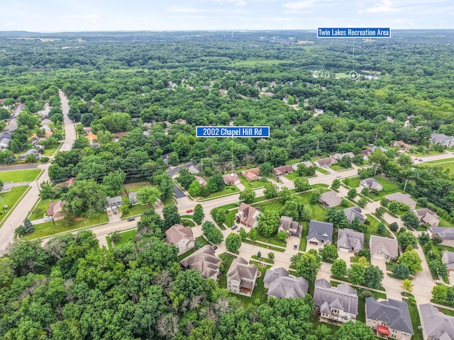 2002 Chapel Hill Rd, Columbia, MO 65203 - aerial view of residential area featuring a forest
