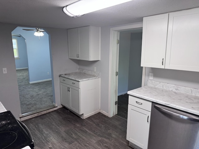 809 S 4th St, Moberly, MO 65259 - kitchen featuring dishwasher, ceiling fan, dark wood-type flooring, white cabinetry, and black range