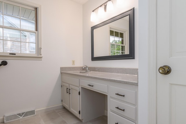 1745 Engelwood Dr, Jefferson City, MO 65101 - bathroom with vanity and baseboards