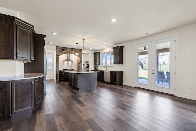 2821 Clopton Ct, Columbia, MO 65203 - kitchen with french doors, stainless steel dishwasher, dark wood-style floors, a center island, and dark brown cabinetry