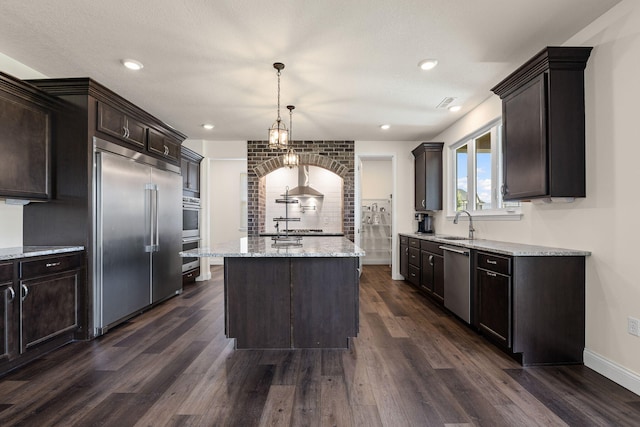 2821 Clopton Ct, Columbia, MO 65203 - kitchen featuring appliances with stainless steel finishes, dark wood-style flooring, and dark brown cabinetry