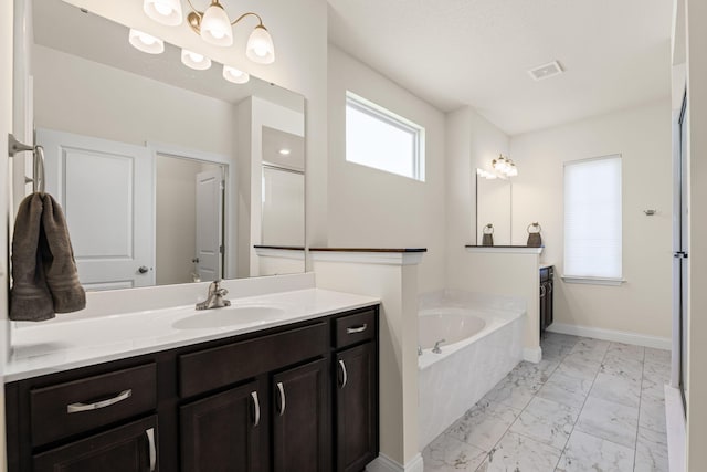 2821 Clopton Ct, Columbia, MO 65203 - full bathroom featuring marble finish floors, vanity, and a bath