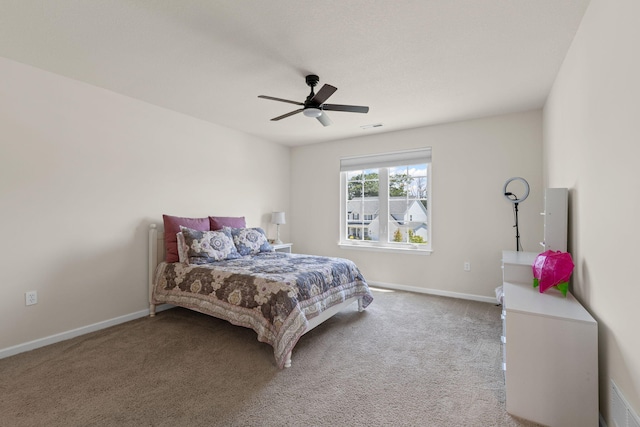 2821 Clopton Ct, Columbia, MO 65203 - carpeted bedroom with baseboards and ceiling fan
