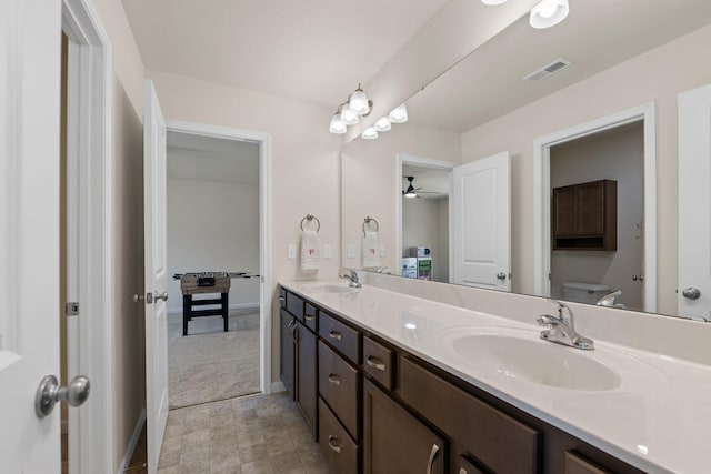 2821 Clopton Ct, Columbia, MO 65203 - bathroom with double vanity and ceiling fan