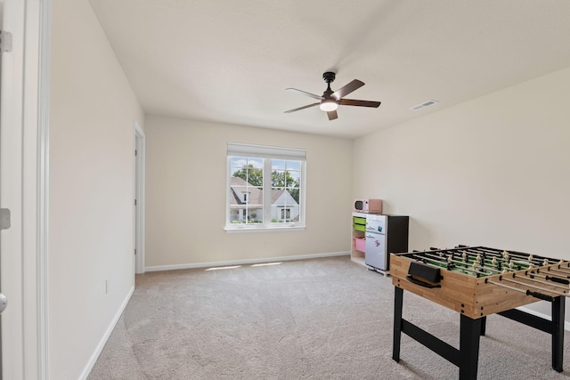 2821 Clopton Ct, Columbia, MO 65203 - recreation room with ceiling fan and light colored carpet