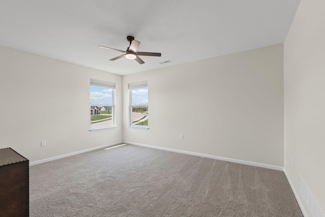 2821 Clopton Ct, Columbia, MO 65203 - spare room with a ceiling fan and carpet floors
