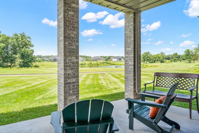 1107 Marcassin Dr, Columbia, MO 65201 - view of patio / terrace featuring a water view and view of golf course
