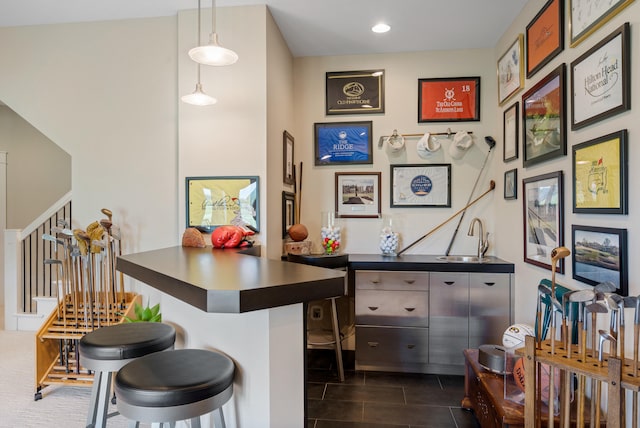 1107 Marcassin Dr, Columbia, MO 65201 - bar with stairs, recessed lighting, and decorative light fixtures
