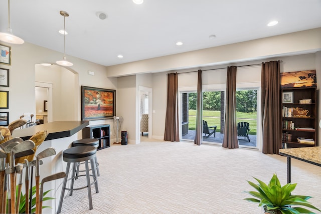 1107 Marcassin Dr, Columbia, MO 65201 - living area featuring light colored carpet, recessed lighting, and arched walkways