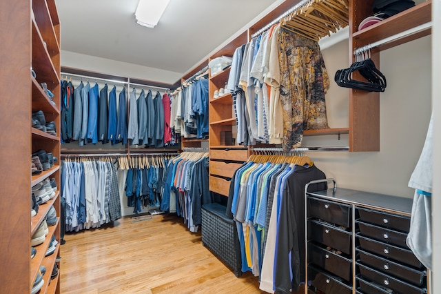 1107 Marcassin Dr, Columbia, MO 65201 - walk in closet featuring wood finished floors