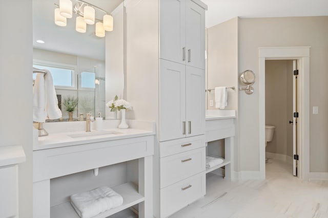 1107 Marcassin Dr, Columbia, MO 65201 - full bath featuring vanity, marble look tiles, and a shower with door