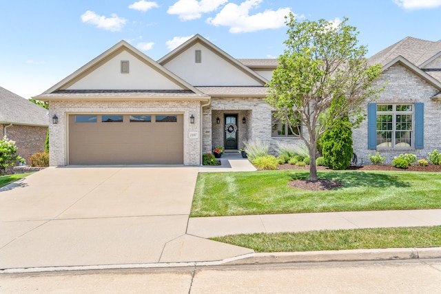 1107 Marcassin Dr, Columbia, MO 65201 - view of front of home featuring stucco siding, brick siding, driveway, a front yard, and an attached garage