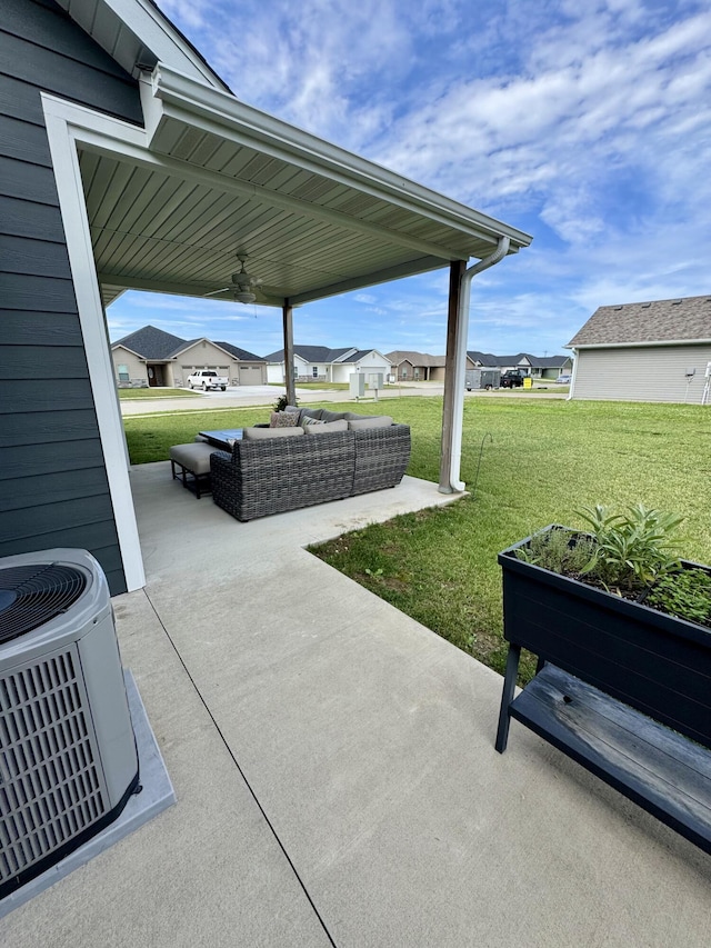 921 S Columbia St, Centralia, MO 65240 - view of patio with an outdoor hangout area, a ceiling fan, and a residential view