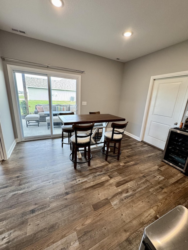 921 S Columbia St, Centralia, MO 65240 - dining room with healthy amount of natural light, dark wood-style flooring, and recessed lighting