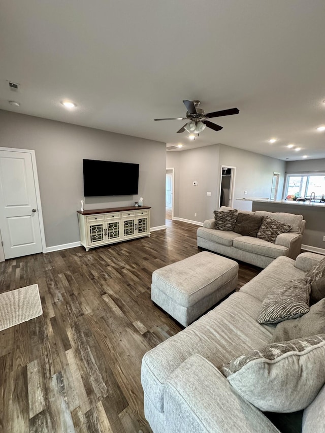 921 S Columbia St, Centralia, MO 65240 - living area with wood finished floors, recessed lighting, and a ceiling fan