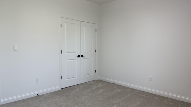 717 Angels Rest Way, Columbia, MO 65203 - unfurnished bedroom featuring carpet floors and a closet