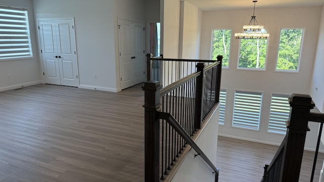 717 Angels Rest Way, Columbia, MO 65203 - staircase with wood finished floors and baseboards
