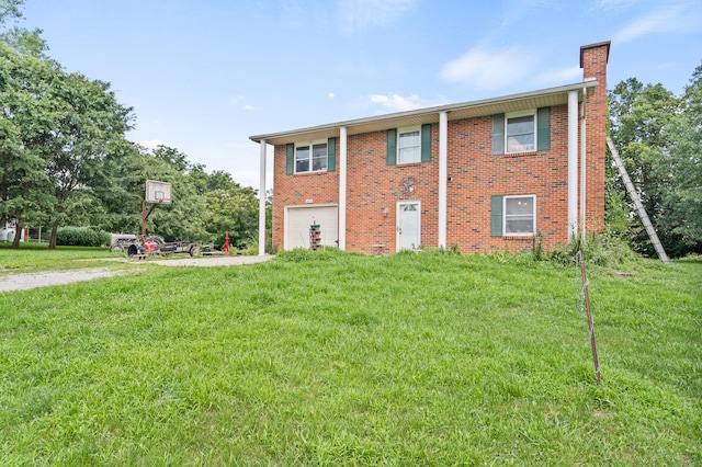 3601 W Hilltop Dr, Columbia, MO 65203 - view of front facade with a chimney, a garage, a front yard, and brick siding