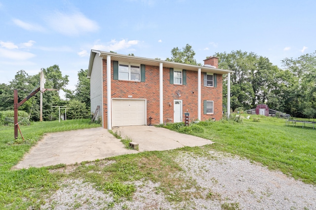 3601 W Hilltop Dr, Columbia, MO 65203 - view of front of house featuring a chimney, concrete driveway, a garage, and a front yard