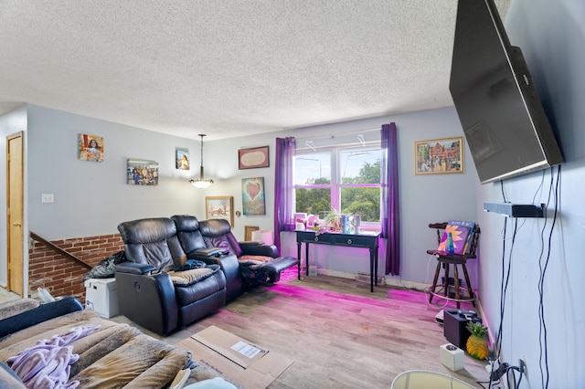 3601 W Hilltop Dr, Columbia, MO 65203 - living room with a textured ceiling and wood finished floors