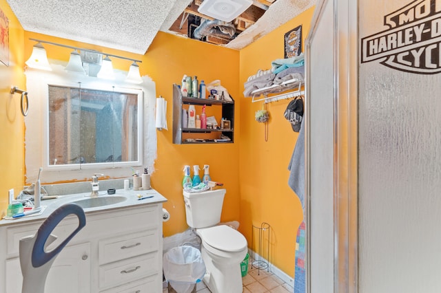 3601 W Hilltop Dr, Columbia, MO 65203 - bathroom featuring vanity, tile patterned floors, and a shower
