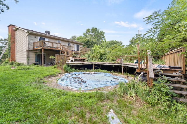 3601 W Hilltop Dr, Columbia, MO 65203 - view of grassy yard with a deck and stairs