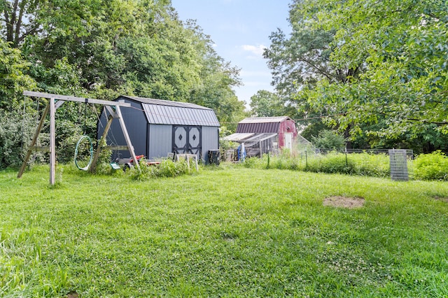 3601 W Hilltop Dr, Columbia, MO 65203 - view of yard featuring a storage unit and view of scattered trees