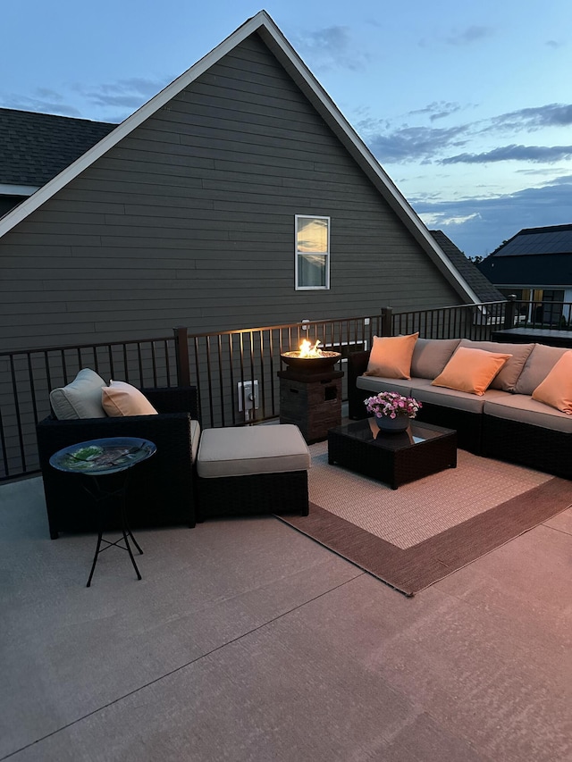 613 Red Feather Ct, Columbia, MO 65203 - view of patio with an outdoor living space with a fire pit