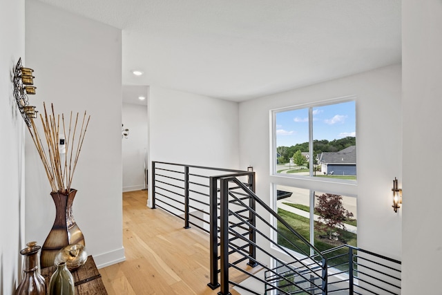 613 Red Feather Ct, Columbia, MO 65203 - corridor featuring an upstairs landing, light wood finished floors, and recessed lighting