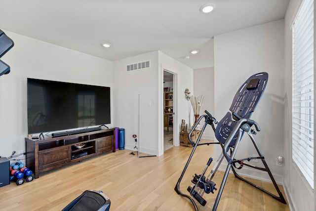 613 Red Feather Ct, Columbia, MO 65203 - workout room with wood finished floors and recessed lighting