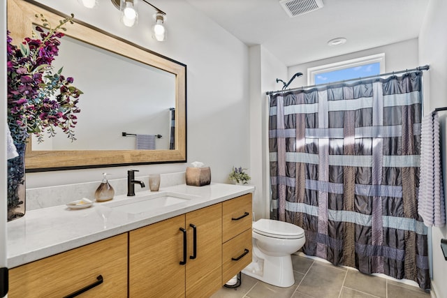 613 Red Feather Ct, Columbia, MO 65203 - bathroom with vanity, tile patterned flooring, and curtained shower