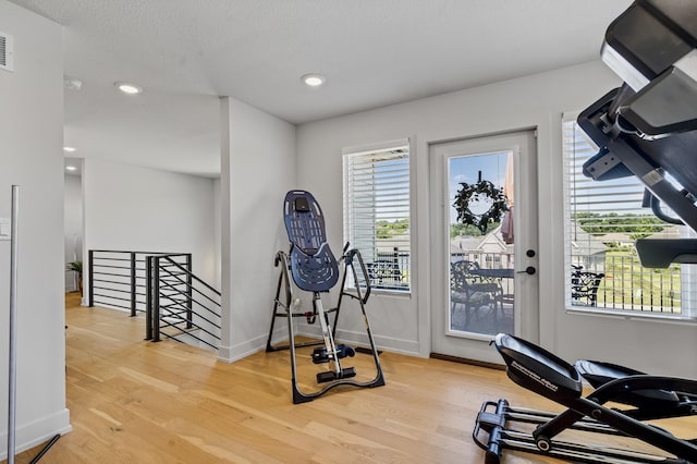 613 Red Feather Ct, Columbia, MO 65203 - workout area featuring wood finished floors and recessed lighting