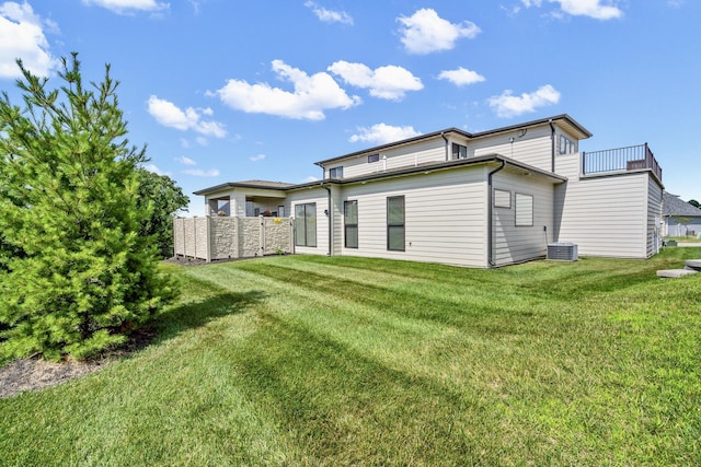 613 Red Feather Ct, Columbia, MO 65203 - rear view of house with a lawn