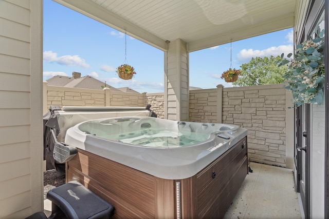 613 Red Feather Ct, Columbia, MO 65203 - view of patio featuring a hot tub