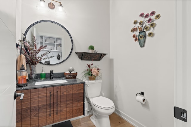 613 Red Feather Ct, Columbia, MO 65203 - bathroom with vanity and wood finished floors