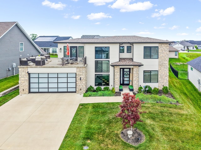 613 Red Feather Ct, Columbia, MO 65203 - view of front facade with stone siding, driveway, a shingled roof, and a residential view